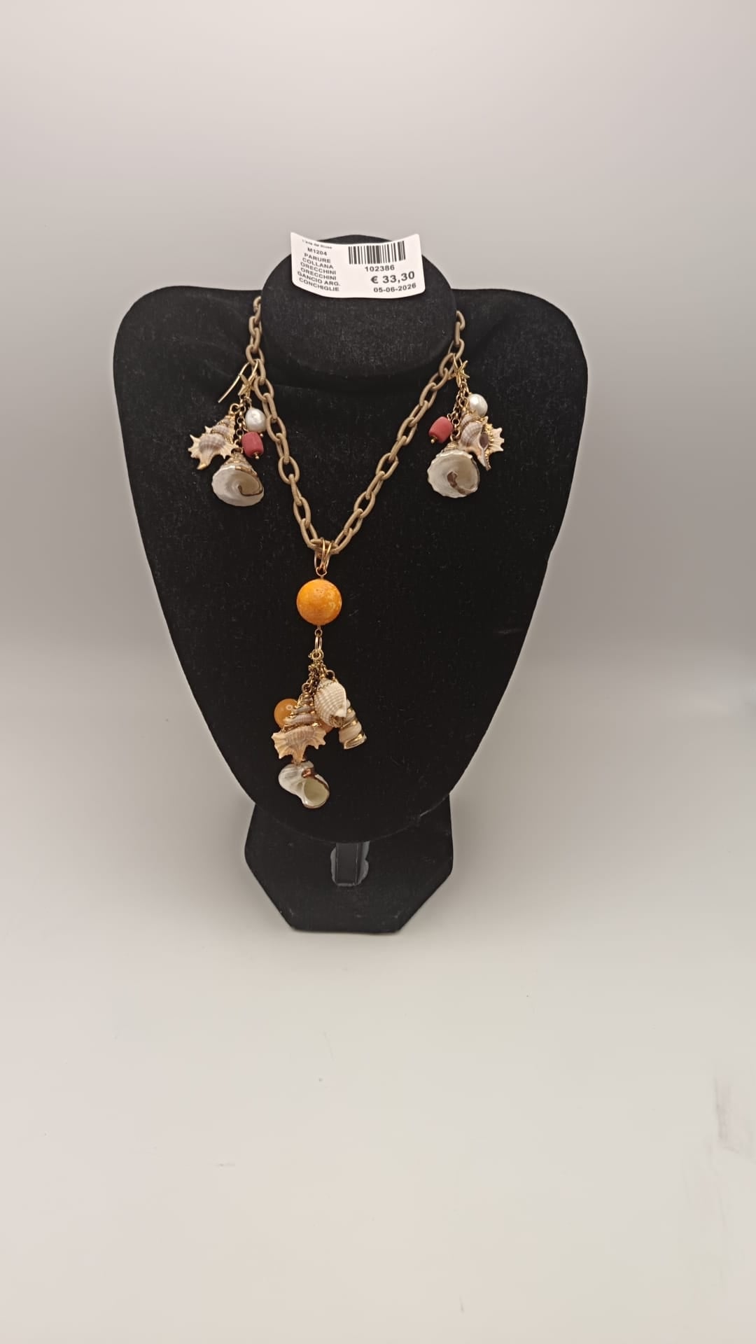 Parure collana e orecchini in argento con conchiglie