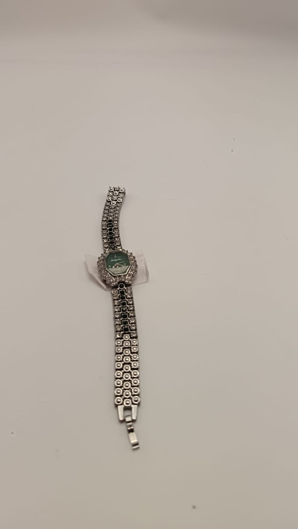 Orologio con brillantini verdi