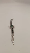 Orologio con brillantini verdi